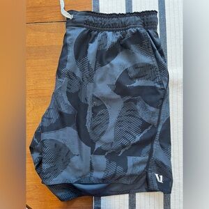 Vuori lined trail running short
